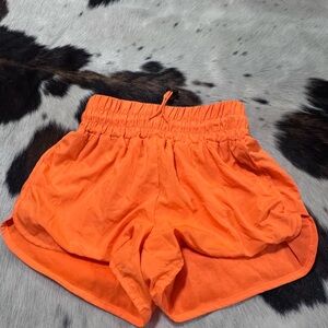 Orange running shorts xs